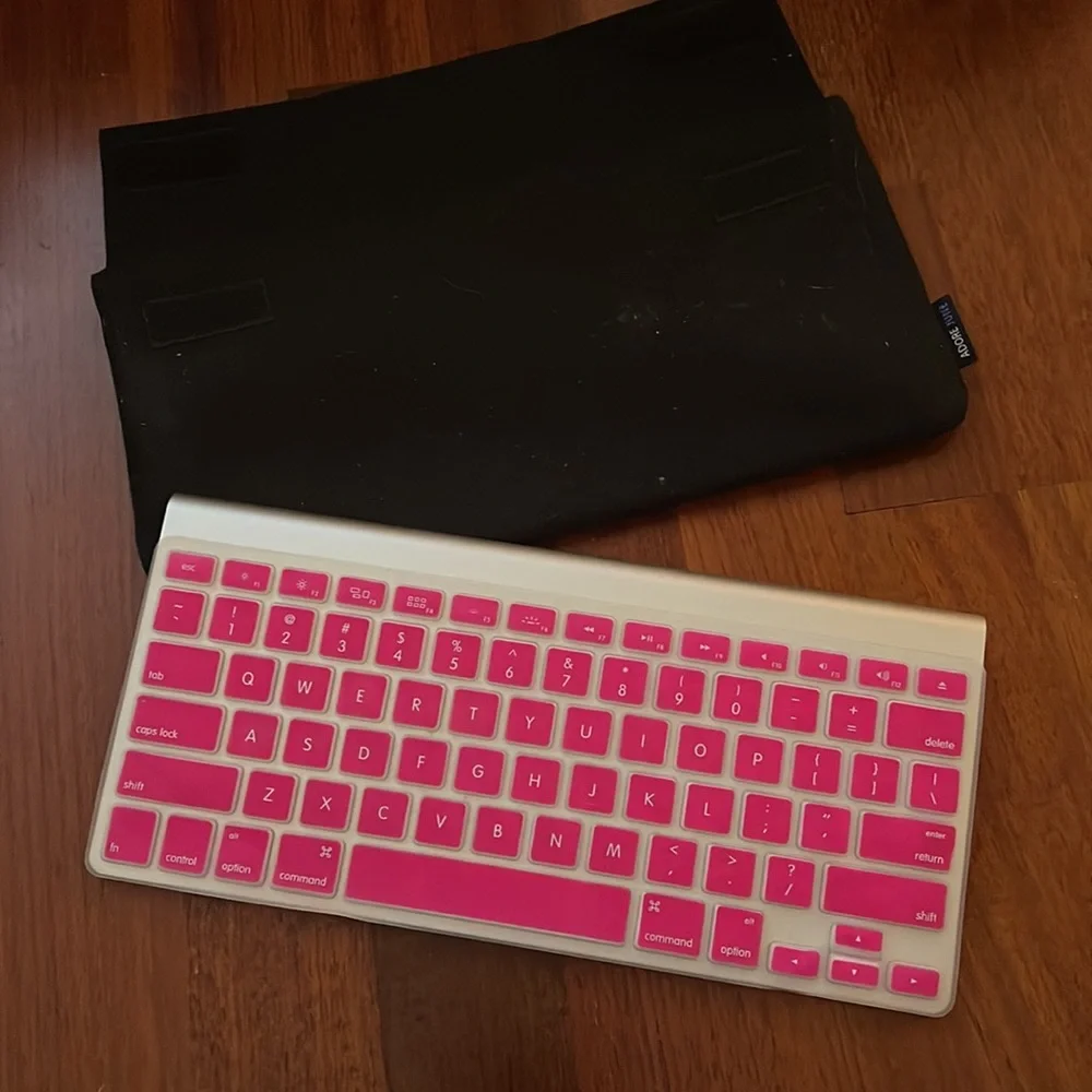 Apple wireless keyboard, case and dust cover for keyboard. Used for grad school.